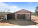 Old shed with open door at 4459 N Old Carriage Rd, Rocky Mount, NC 27804