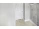 Clean bathroom featuring a glass door shower at 4820 Landover Arbor Pl, Raleigh, NC 27616