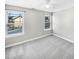 Bright bedroom features two windows allowing for an abundance of natural light at 4820 Landover Arbor Pl, Raleigh, NC 27616