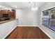Open dining area featuring hardwood floors at 4820 Landover Arbor Pl, Raleigh, NC 27616