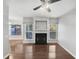Spacious living room with a fireplace and gleaming hardwood floors at 4820 Landover Arbor Pl, Raleigh, NC 27616