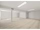 Finished basement with recessed lighting and neutral carpeting at 5620 Winthrop Dr, Raleigh, NC 27612