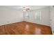 Spacious bedroom features hardwood floors, natural light, and a closet for storage at 5620 Winthrop Dr, Raleigh, NC 27612