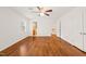 Bedroom featuring hardwood floors and access to bathroom and hallway at 5620 Winthrop Dr, Raleigh, NC 27612