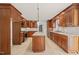 Spacious kitchen featuring a large kitchen island, custom cabinets and stainless appliances at 5620 Winthrop Dr, Raleigh, NC 27612