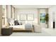 Modern bedroom with a comfortable bed, two windows, side table, and decorative artwork at 616 Emerald Bay Cir, Raleigh, NC 27610
