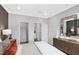 Bright bedroom with open doors to closet and bathroom at 625 Emerald Bay Cir, Raleigh, NC 27610