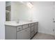 Bathroom with double sink vanity and large mirror at 68 Commons Cir # 223, Clayton, NC 27520