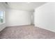 Bedroom with neutral carpet, natural light, and ample closet space at 68 Commons Cir # 223, Clayton, NC 27520