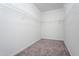 Walk-in closet with wire shelving, ready to be organized at 68 Commons Cir # 223, Clayton, NC 27520