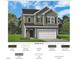 Charming two-story home with neutral siding, a two-car garage and well-maintained landscaping at 68 Commons Cir # 223, Clayton, NC 27520