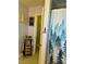 This vibrant bathroom features forest-themed shower curtain and charming decorations at 70 Maxwell Pl, Lillington, NC 27546