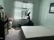 Bright bedroom with neutral walls, and plush carpet at 70 Maxwell Pl, Lillington, NC 27546