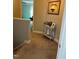 Carpeted hallway leading to living room at 70 Maxwell Pl, Lillington, NC 27546