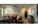 Comfortable living room with plush sofas, ceiling fan, and stylish decor, perfect for relaxation at 70 Maxwell Pl, Lillington, NC 27546