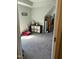 Attic playroom with plush carpet and ample storage at 70 Maxwell Pl, Lillington, NC 27546