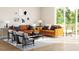 Cozy living room filled with natural light from the sliding glass door at 806 Hyperion Aly, Wake Forest, NC 27587