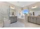 Elegant main bathroom features marble floors, dual vanities, a soaking tub, and a glass shower at 812 Emerald Bay Cir, Raleigh, NC 27610