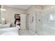 Bathroom with marble tile shower, separate room with bedroom, and large sink vanity at 840 Emerald Bay Cir, Raleigh, NC 27610