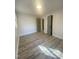 Clean bedroom features new floors, fresh paint, and two large closets at 905 Spruce Pine Trl, Durham, NC 27705