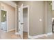 Hallway view with closet and laundry room featuring a white washer and dryer at 200 Faith Ave, Sanford, NC 27330