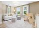 Cozy living room with couch, rug, tent, and natural lighting at 200 Faith Ave, Sanford, NC 27330