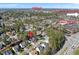 An aerial view showing the home's location near local shopping centers, restaurants, and major traffic routes at 102 Ashley Brook Ct, Cary, NC 27513