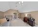 Spacious bonus room with neutral carpet, ceiling fan, natural light, and flex space at 102 Ashley Brook Ct, Cary, NC 27513