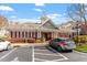 Attractive clubhouse with classic architecture, surrounded by lush landscaping and convenient parking at 10321 Sablewood Dr # 108, Raleigh, NC 27617