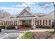 Well-manicured community center with detailed landscaping and an inviting entrance at 10321 Sablewood Dr # 108, Raleigh, NC 27617