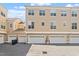 Exterior shot of townhome garages in a well-maintained community, offering convenient parking at 10321 Sablewood Dr # 108, Raleigh, NC 27617