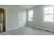 Neutral bedroom with soft carpet and a double door closet at 104 Bearwallow Forest Way, Wendell, NC 27591