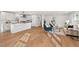 Spacious open floor plan with a modern kitchen seamlessly flowing into the living area at 1204 Donphil Rd, Durham, NC 27712