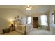Bright bedroom featuring vaulted ceiling and ample natural light at 1226 Woodland Church Rd, Wake Forest, NC 27587