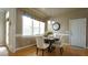 Cozy dining area with round table, chairs, and window at 1226 Woodland Church Rd, Wake Forest, NC 27587