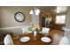 Cozy dining area with hardwood floors and chandelier at 1226 Woodland Church Rd, Wake Forest, NC 27587