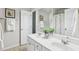 Bathroom features a double sink vanity, providing ample space and convenience at 12566 Honeychurch St, Raleigh, NC 27614