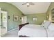 Cozy primary bedroom with neutral tones, large bed, and carpeted floor at 12566 Honeychurch St, Raleigh, NC 27614