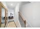 Bright entryway features a staircase and a view into the dining room at 1309 Atterlee Ln, Graham, NC 27253
