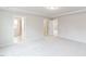 Bright main bedroom boasts neutral color scheme and an ensuite bathroom for convenience at 1309 Atterlee Ln, Graham, NC 27253