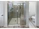 Modern bathroom with glass shower and tile surround at 1336 Weavers Trace Dr, Zebulon, NC 27597