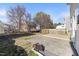 Backyard featuring a small wood deck and an adjacent concrete patio at 1420 Springshire Ct, Raleigh, NC 27610