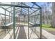 Interior view of a greenhouse with brick flooring and growing benches at 1600 Patterson Grove Rd, Apex, NC 27502