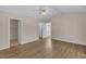 Spacious bedroom with hardwood floors and multiple closets at 1614 W Cotton Gin Dr, Clayton, NC 27527