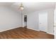 Bedroom featuring a ceiling fan, hardwood floor, and attached bathroom at 1614 W Cotton Gin Dr, Clayton, NC 27527
