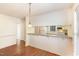 Kitchen features granite countertops and modern appliances; perfect for cooking and entertaining at 1614 W Cotton Gin Dr, Clayton, NC 27527