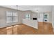 The living room features a fireplace, built-in shelving, and a door to the outside at 1614 W Cotton Gin Dr, Clayton, NC 27527