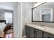 Bathroom features granite countertops and view into the bedroom at 174 St. Andrews Ln, Chapel Hill, NC 27517