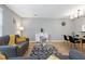 Bright and spacious living area with hardwood flooring, modern furniture, and an open floor plan at 174 St. Andrews Ln, Chapel Hill, NC 27517