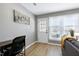 Comfortable office space with a wooden desk and bright windows at 174 St. Andrews Ln, Chapel Hill, NC 27517